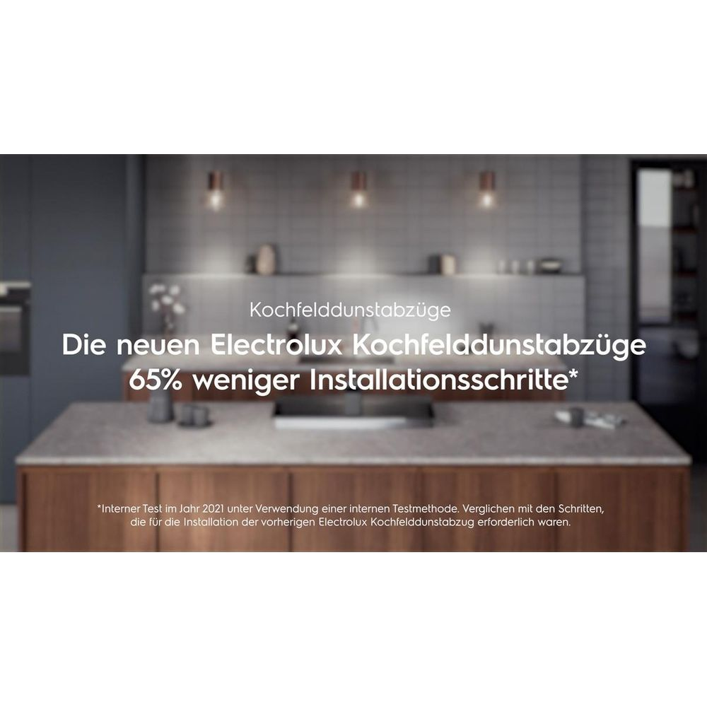 Cuisine moderne avec extracteur intégré et texte promotionnel blanc au premier plan.