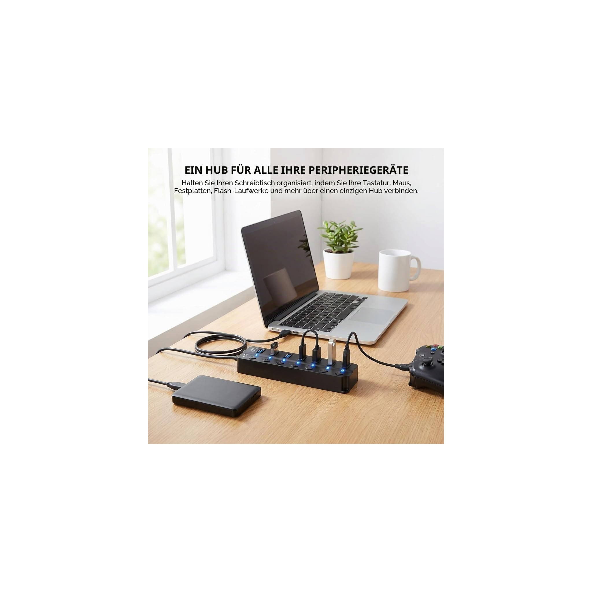 Ein schwarzer USB-Hub auf einem Schreibtisch, verbunden mit einem Laptop, einer externen Festplatte und Peripheriegeräten.