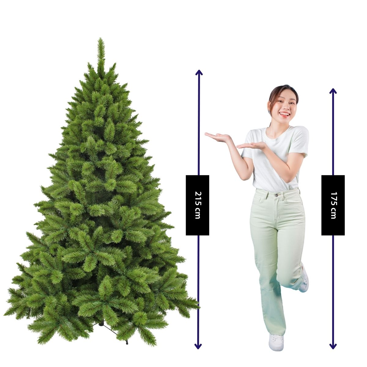 A woman in light clothes stands next to a Christmas tree, with height markers of 215 cm and 175 cm.