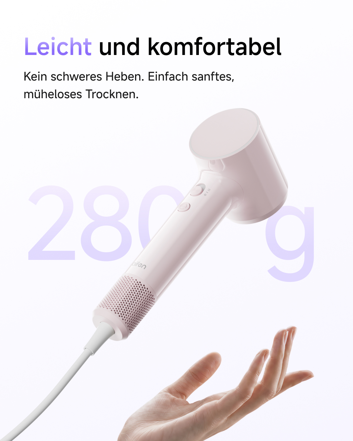 Ein leichter, rosafarbener Haartrockner schwebt über einer offenen Hand vor weißem Hintergrund.