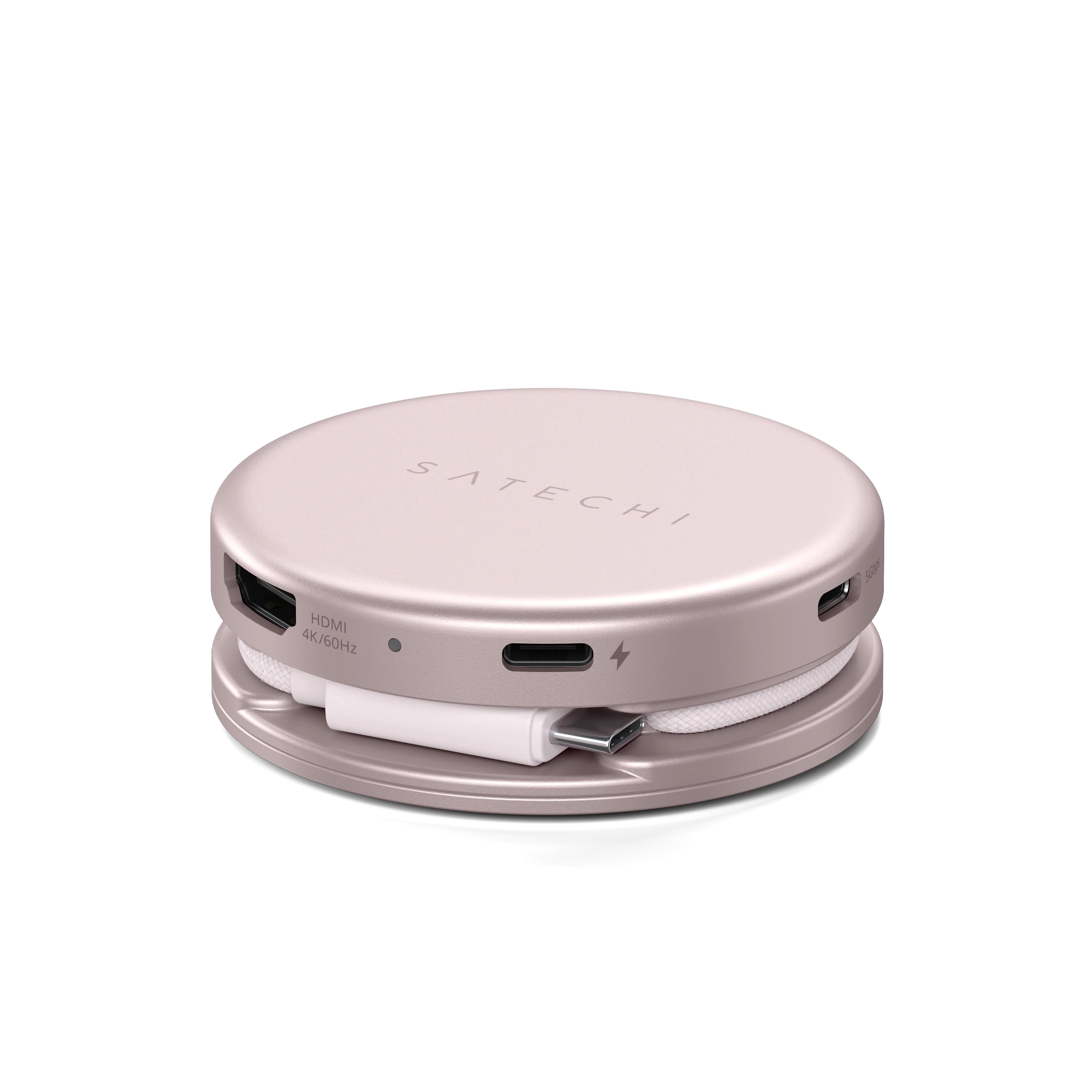 Okrągły hub USB-C Satechi w kolorze różowego złota z HDMI, portami i zwiniętym kablem na białym tle.