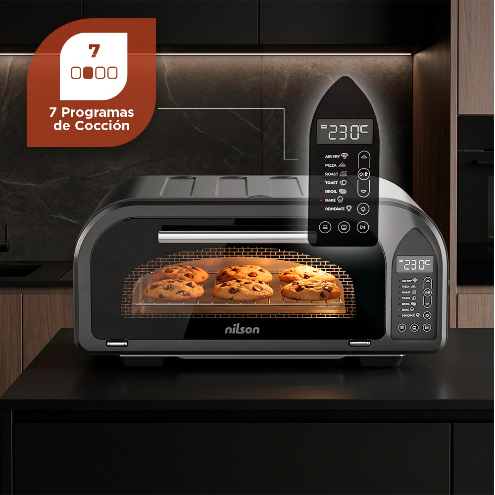 Un horno negro Nilson en la encimera horneando galletas, con pantalla digital y 7 programas de cocción.