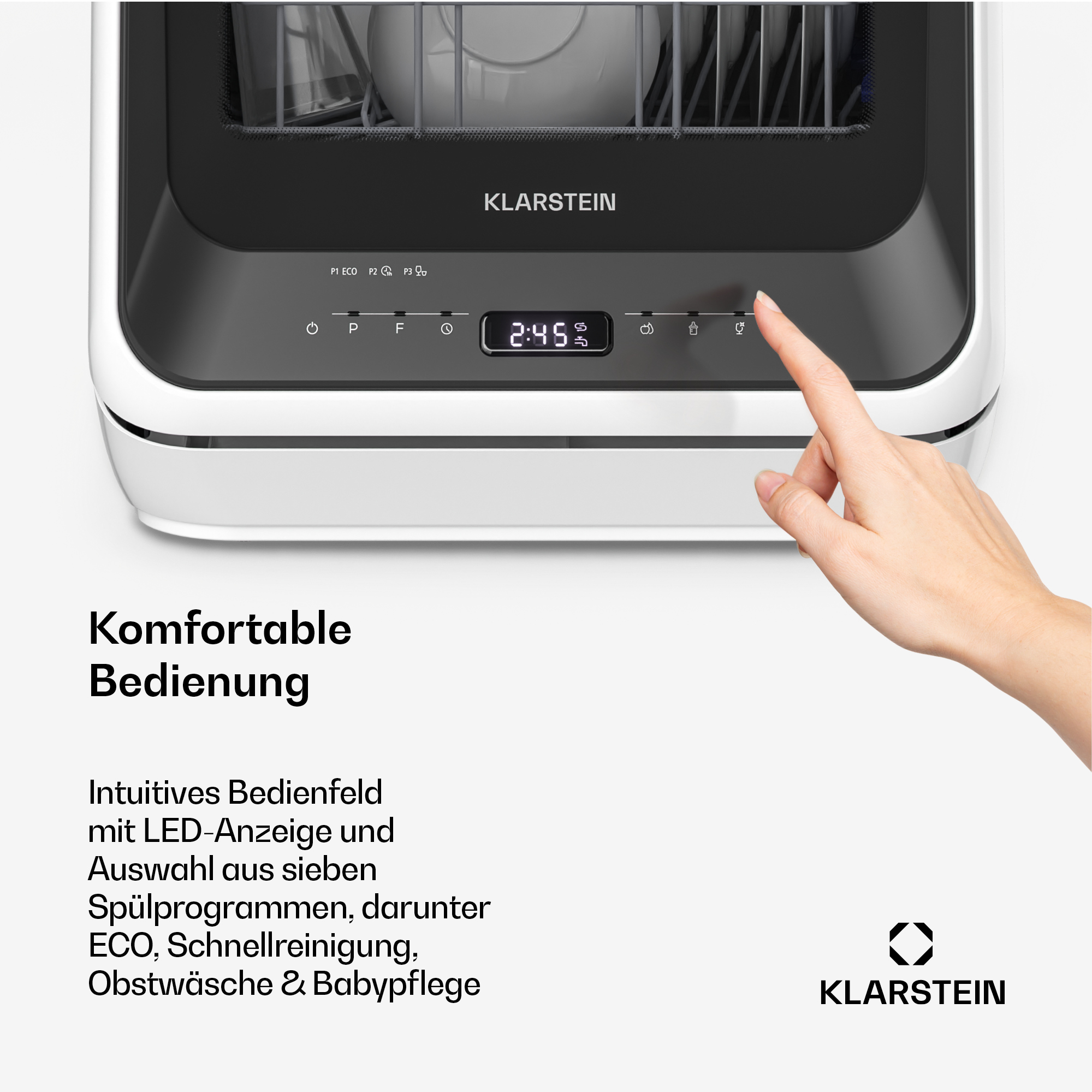 Mano che aziona il pannello di controllo LED di una lavastoviglie Klarstein.