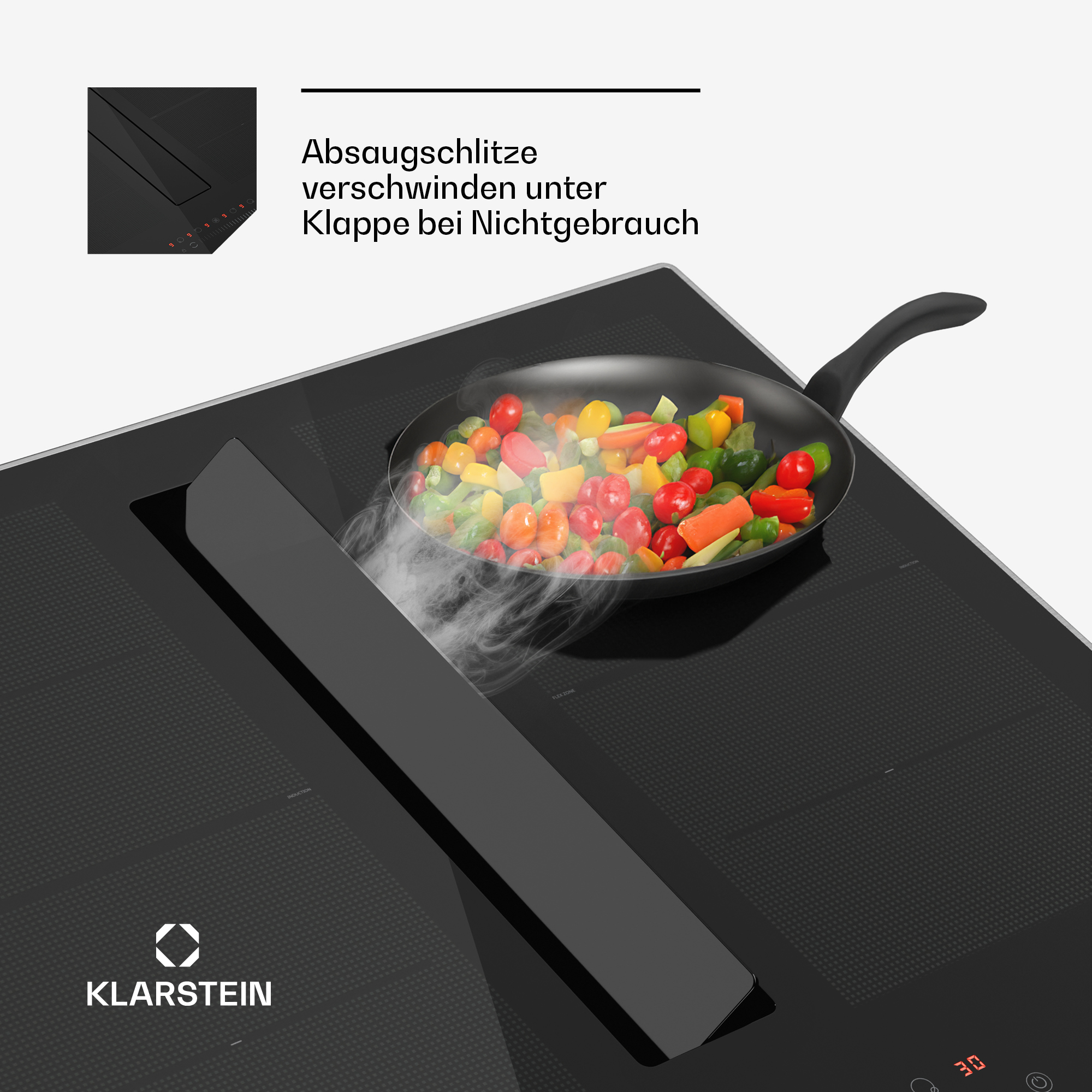 Schwarzes Induktionskochfeld mit Pfanne voller Gemüse und integriertem Dunstabzug.
