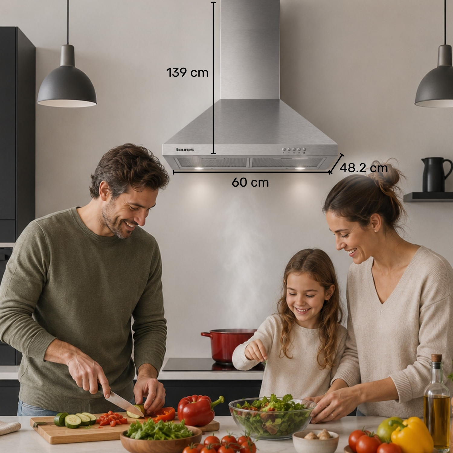 Una familia cocina en una cocina bajo una campana extractora de acero inoxidable con medidas.