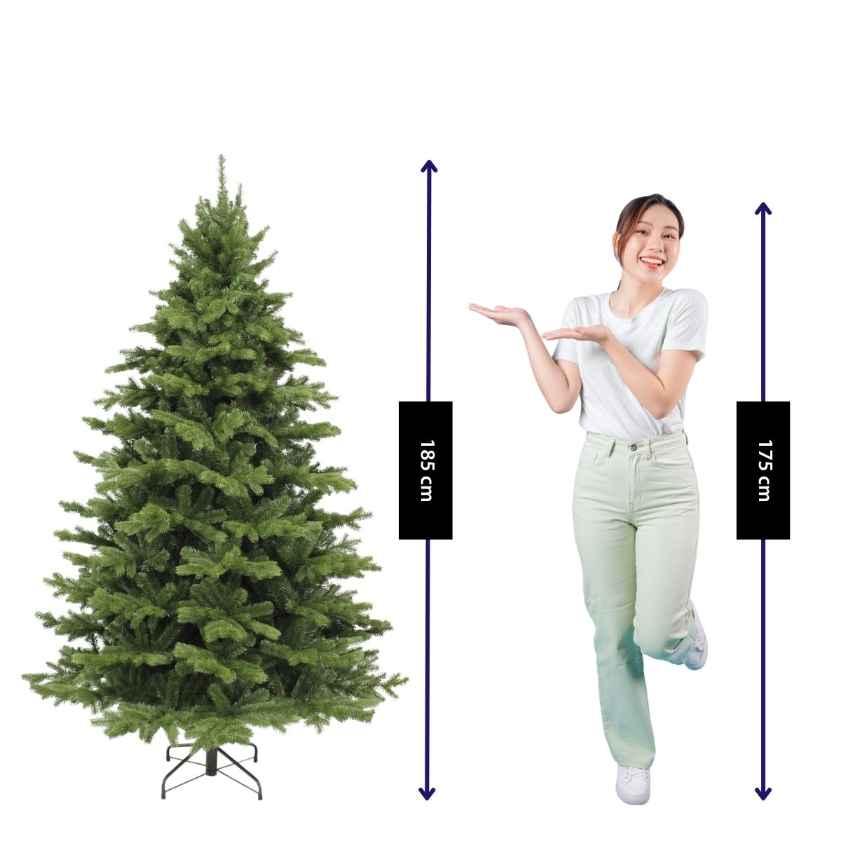 A woman in light clothing stands next to a Christmas tree with height measurements.