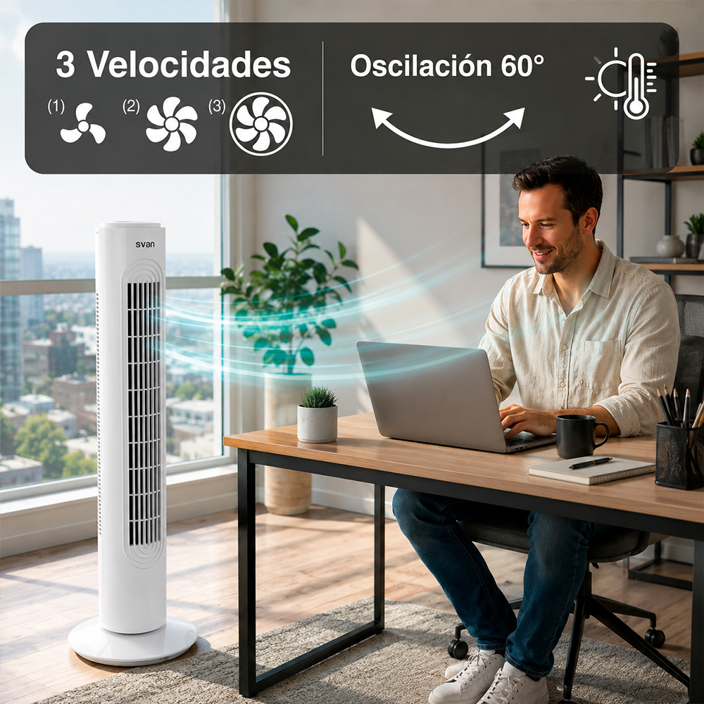 Un ventilador de torre blanco enfría a un hombre en un portátil en una habitación soleada.