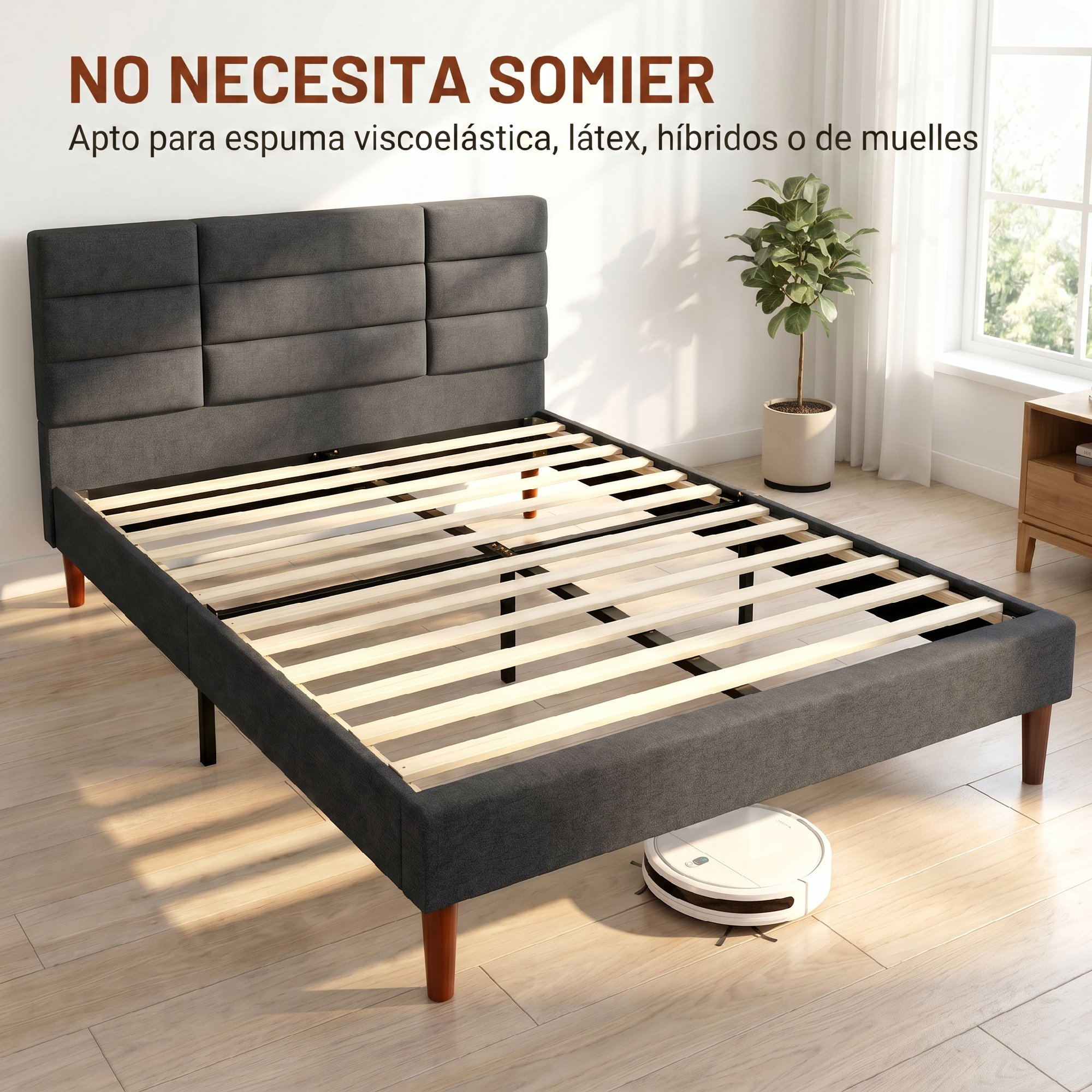 Cama tapizada en gris oscuro con listones de madera y espacio debajo en habitación luminosa.