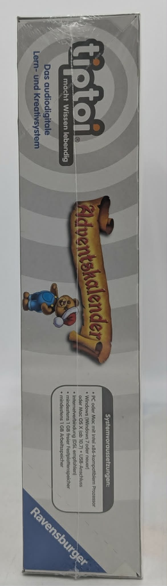 Verpackungsseite eines Tiptoi Adventskalenders mit Bär und Systemvoraussetzungen.