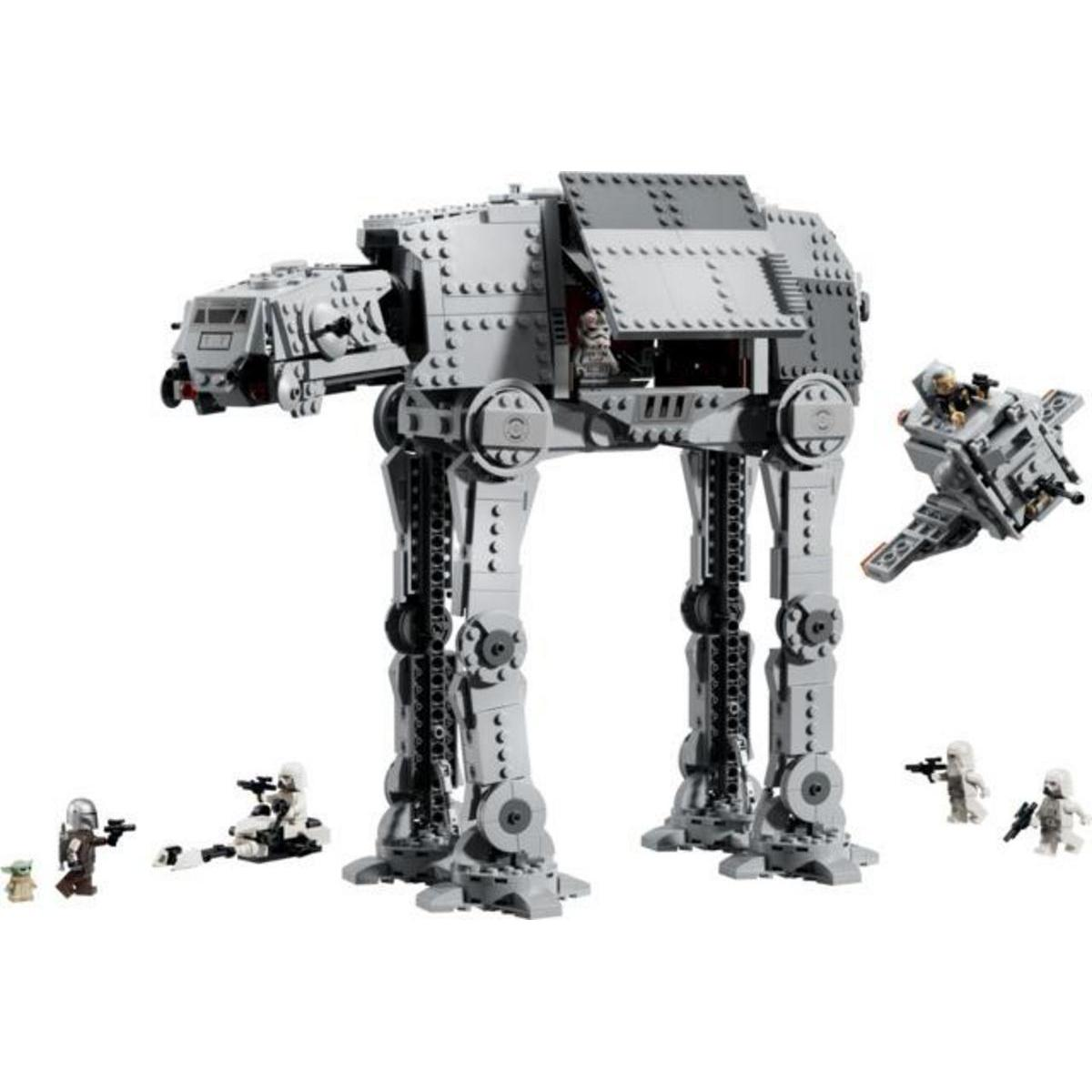 Un caminante AT-ST de Lego Star Wars con minifiguras y una pequeña moto deslizadora.