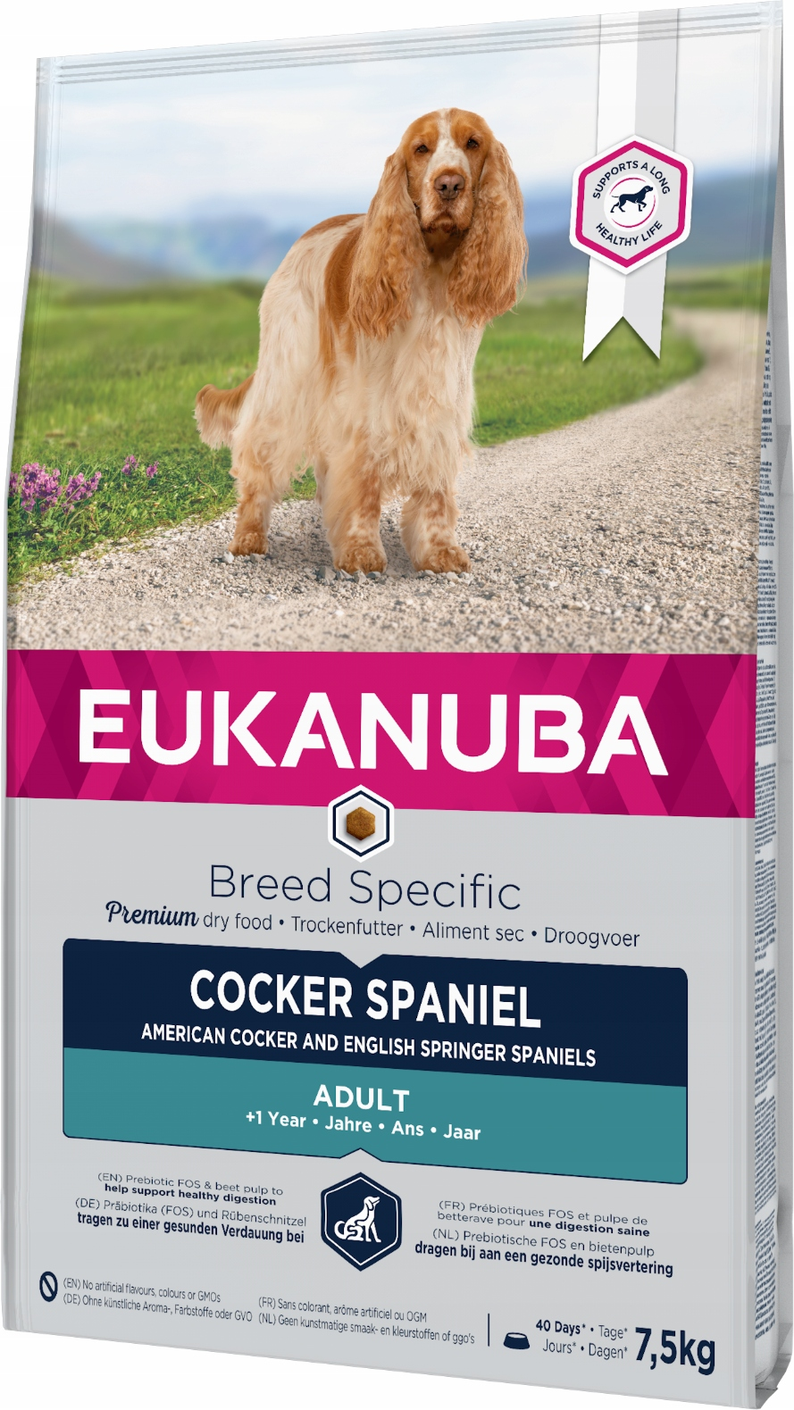 Torba karmy dla psów Eukanuba ze spanielem cockerem na ścieżce w zielonymkrajobrazie.