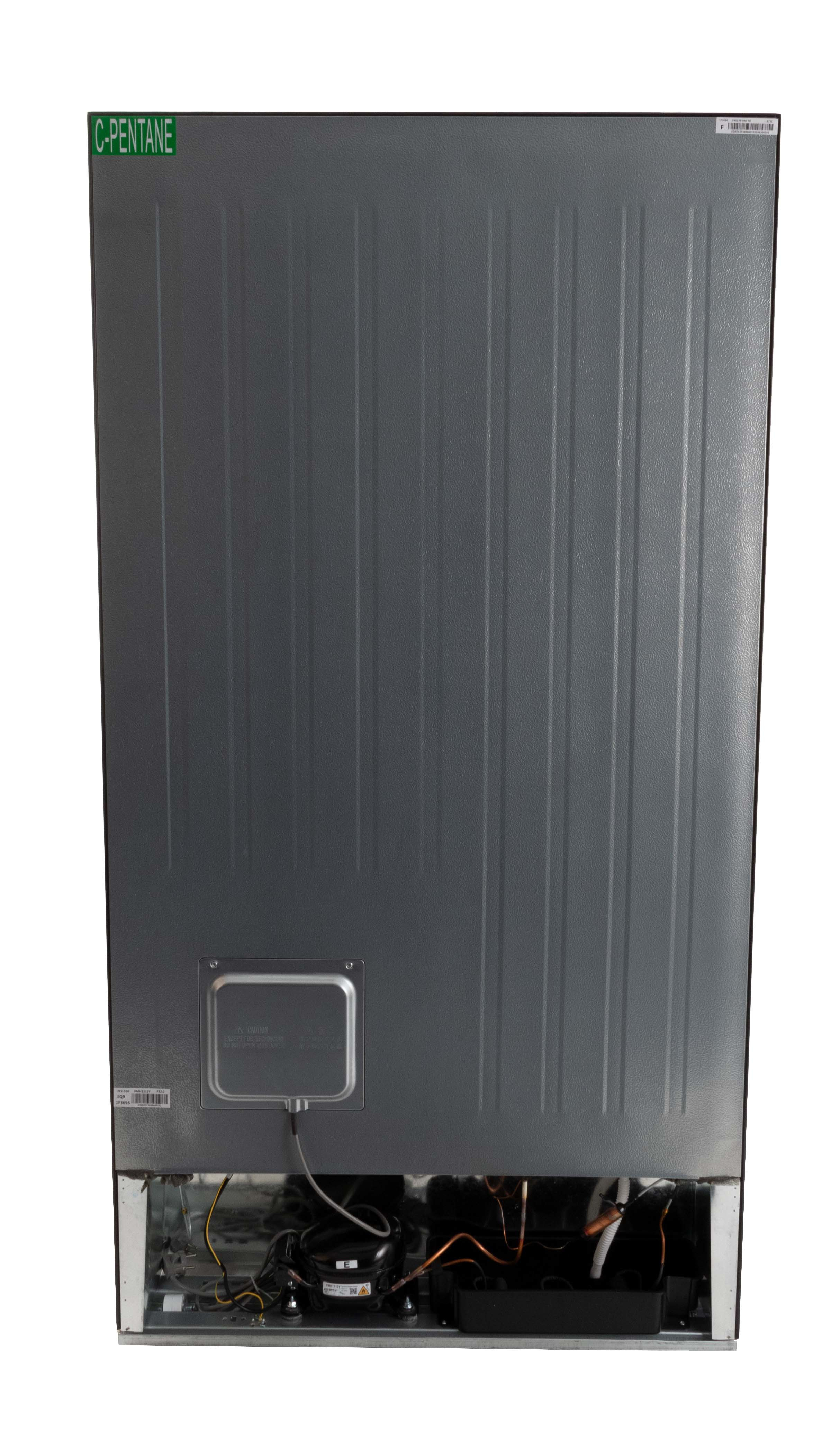 Back of a refrigerator showing a grey metal panel, compressor, copper tubes, and a green C-Pentane sticker.