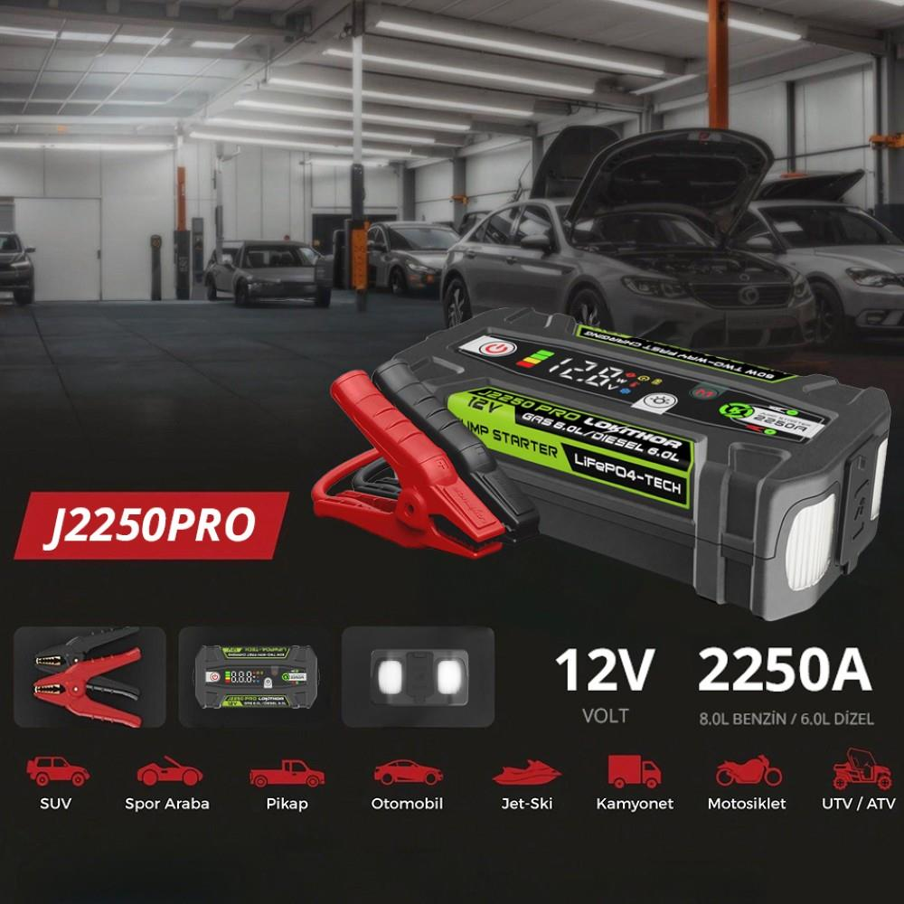 Garaj içinde kırmızı maşalı J2250PRO 12V araba takviye cihazı.
