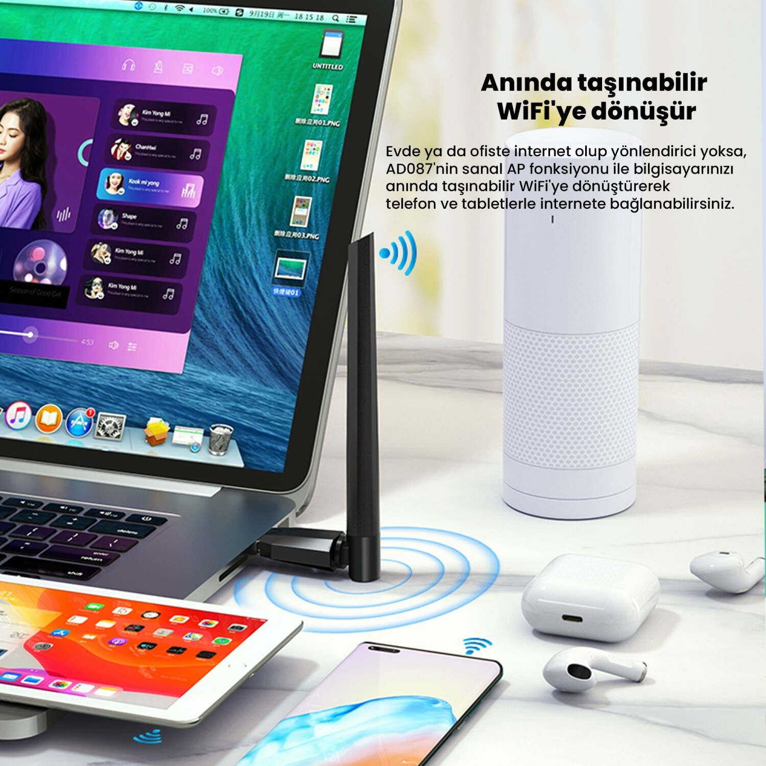 Bir masa üzerinde dizüstü bilgisayar, tablet, akıllı telefon ve silindirik yönlendirici.