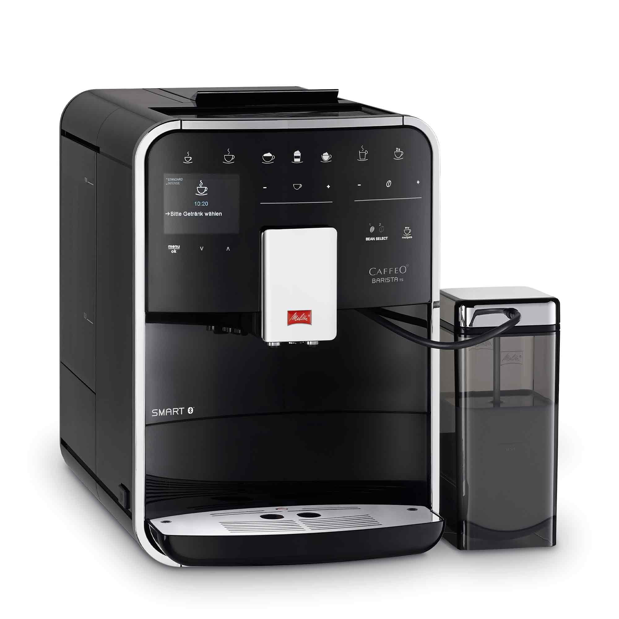 Eine schwarz-silberne Melitta Caffeo Barista TS Smart Kaffeemaschine mit Milchbehälter.