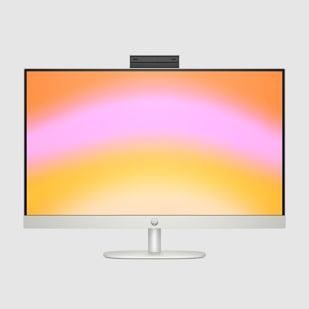 Monitor HP z pomarańczowo-różową tapetą z gradientem i przymocowaną u góry kamerą internetową.