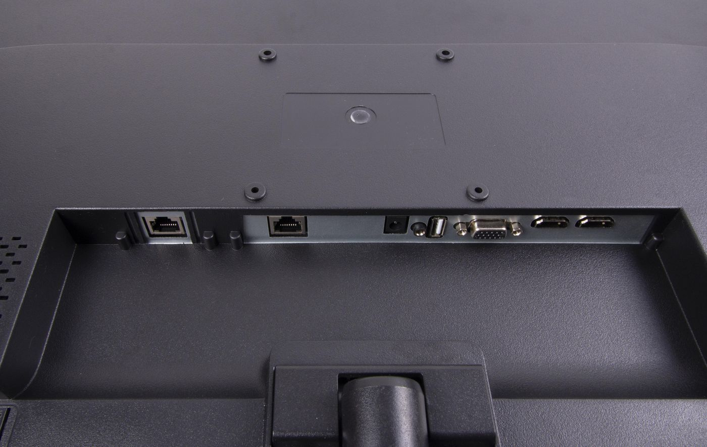 Retro di un monitor con varie porte tra cui HDMI, VGA, USB e rete.