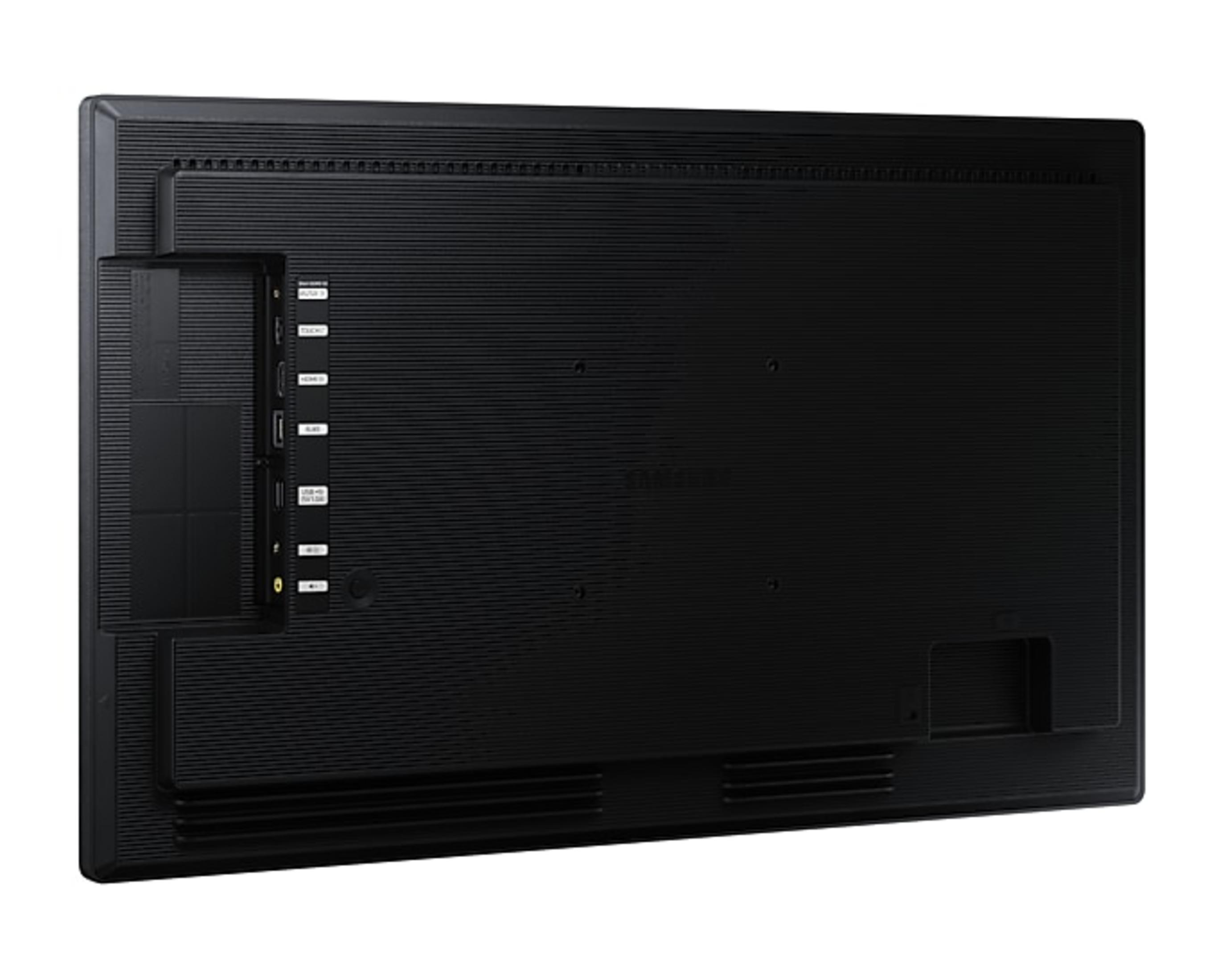 Il retro di un monitor Samsung nero con porte sul lato sinistro e fessure di ventilazione.