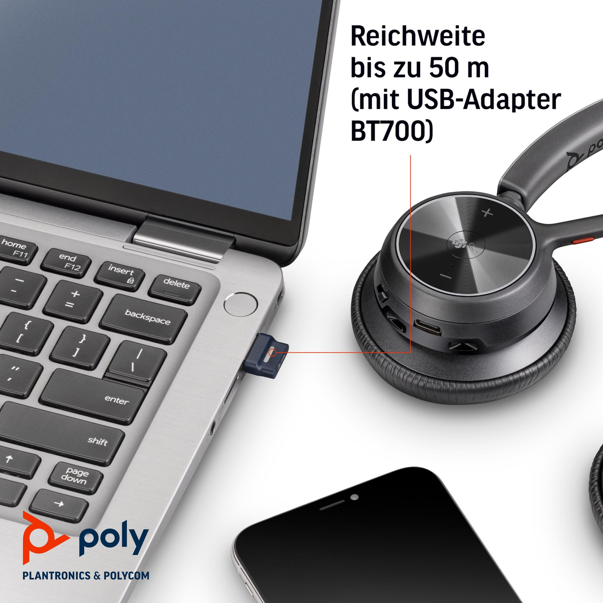 Koptelefoon verbonden met laptop via USB-adapter, bereik tot 50 meter.