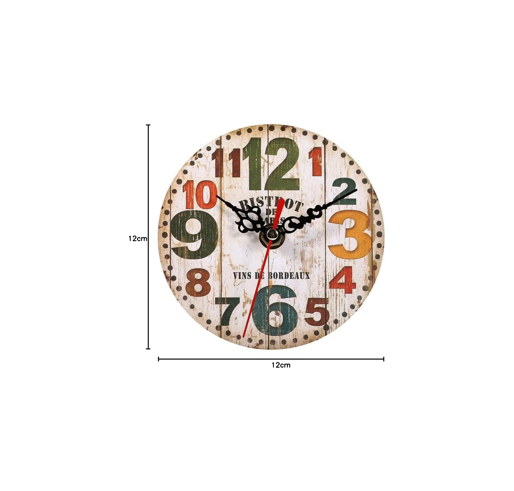 Eine runde, 12x12 cm große Vintage-Wanduhr mit bunten, großen Zahlen im Used-Look und schwarzen Zeigern auf weißem Holz.