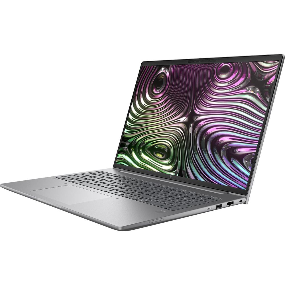 Un laptop argentato con una grafica astratta e ondulata in rosa e verde sullo schermo.