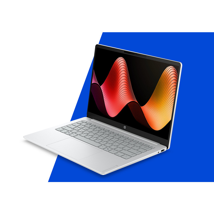 A silver laptop with a colorful red and orange abstract wallpaper, positioned against a blue and white background.