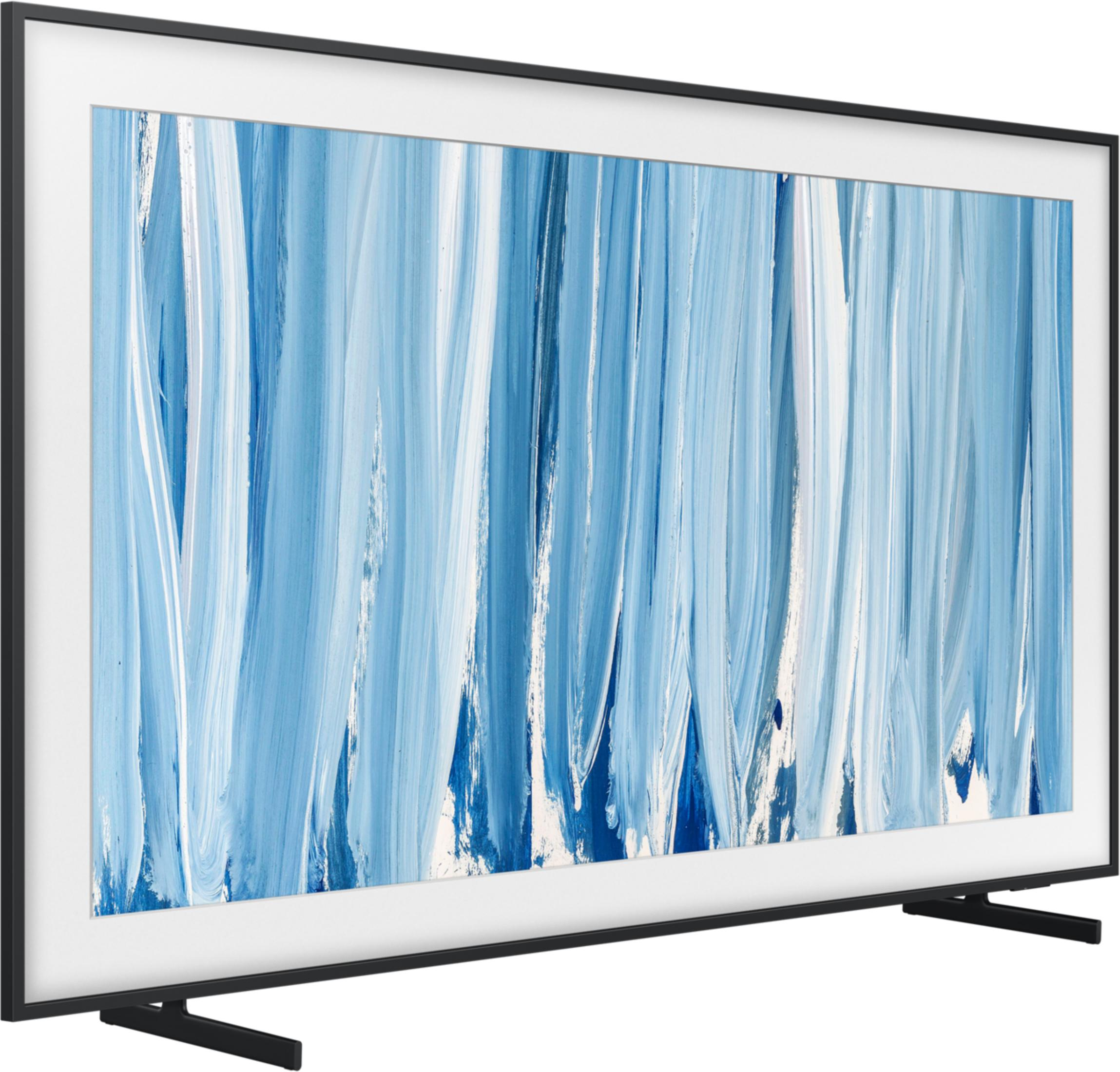Ayaklı modern bir TV, ekranında soyut mavi ve beyaz bir tablo gösteriyor.