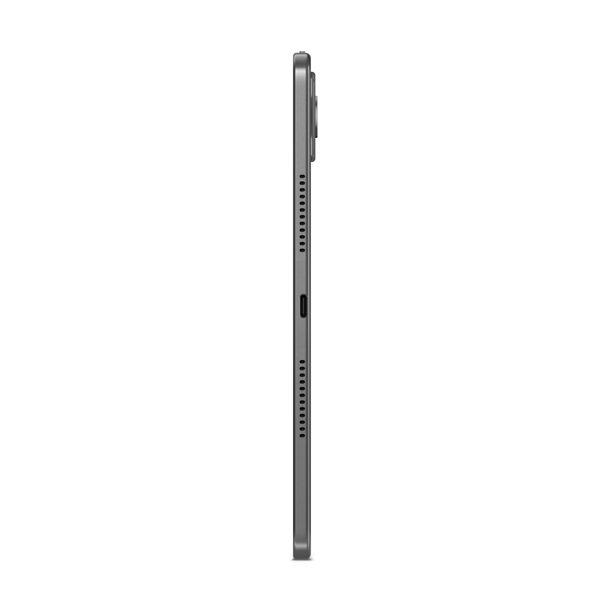Vista laterale di un tablet grigio con altoparlanti e porta USB.