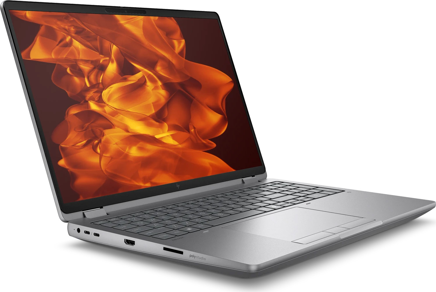 Srebrny laptop z jasnym, pomarańczowym, abstrakcyjnym tłem wyświetlanym na ekranie.