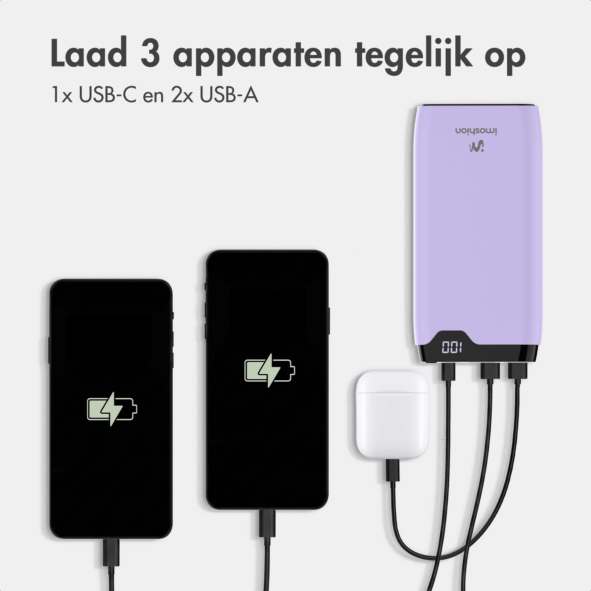 Un power bank lavanda carica tre dispositivi contemporaneamente tramite cavi neri.