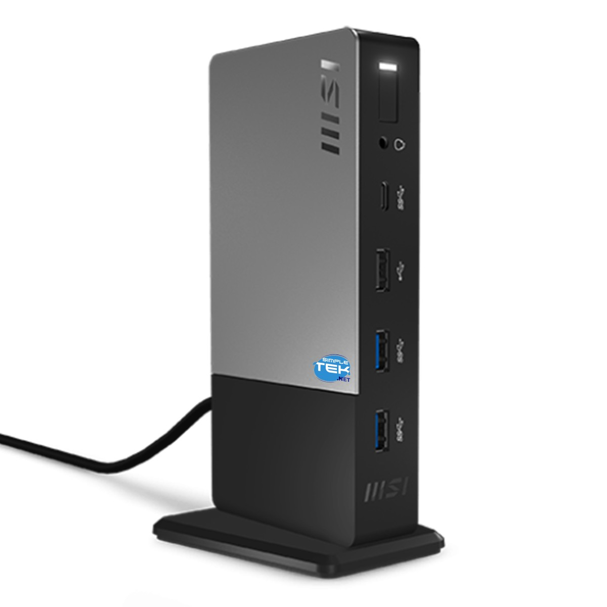 Un hub per docking station MSI grigio e nero si trova su una superficie bianca con un cavo collegato.