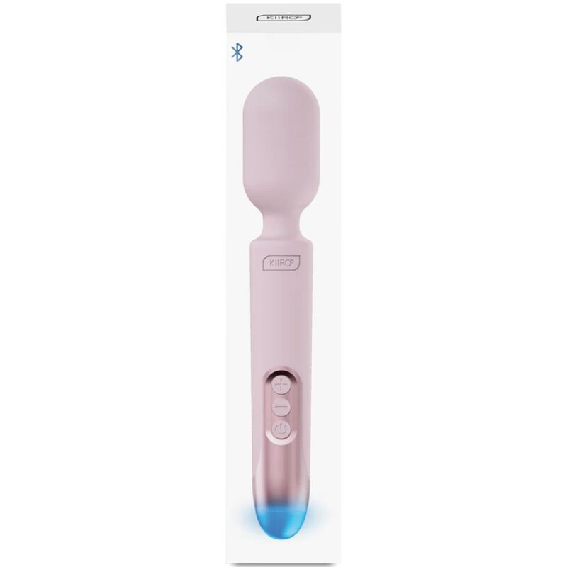 Ein rosafarbener Kiiroo-Vibrator mit runden Kopf, Steuertasten und blau leuchtendem Griffende in weißer Verpackung.