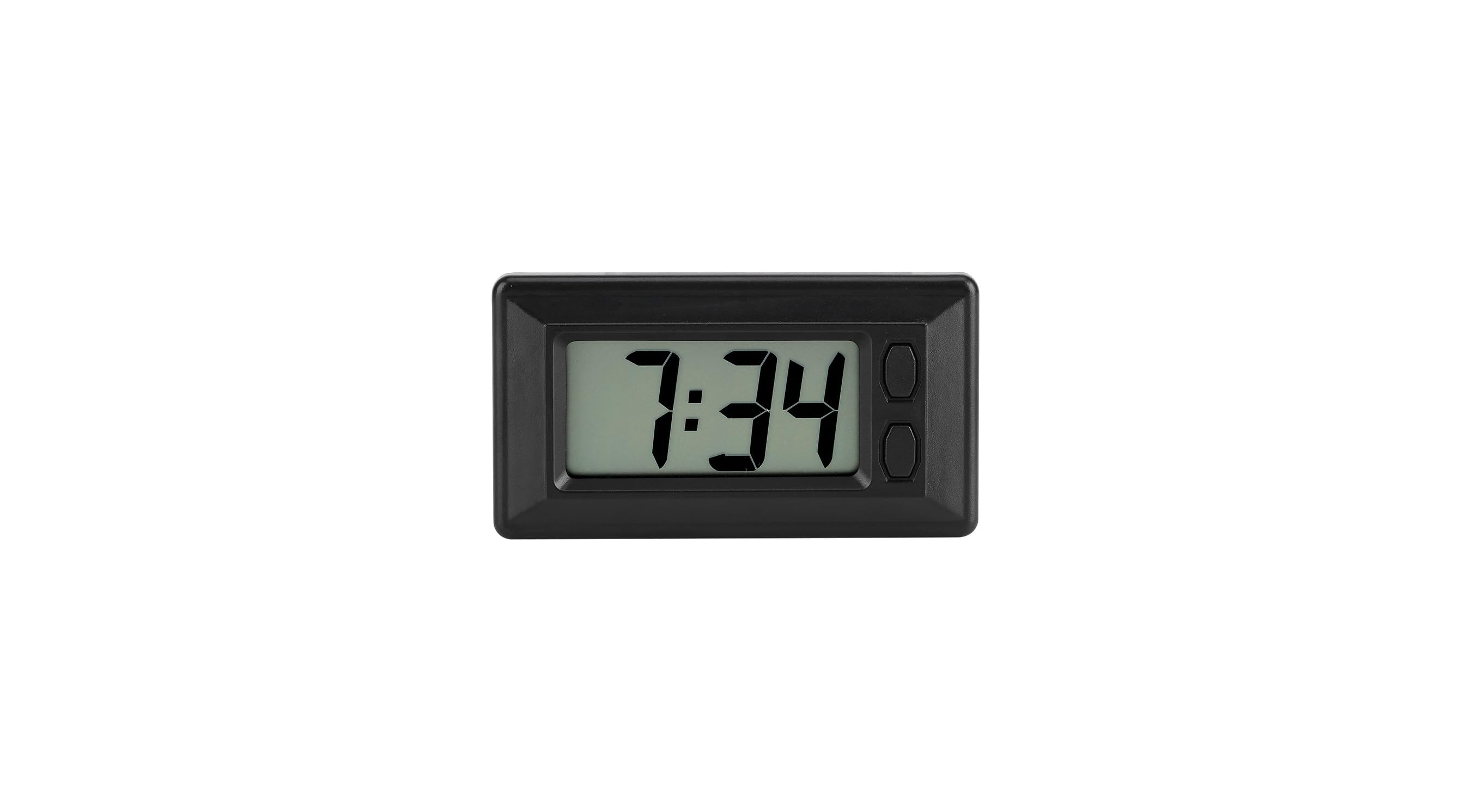 Eine kleine schwarze Digitaluhr zeigt die Zeit 7:34 auf einem grauen Display.