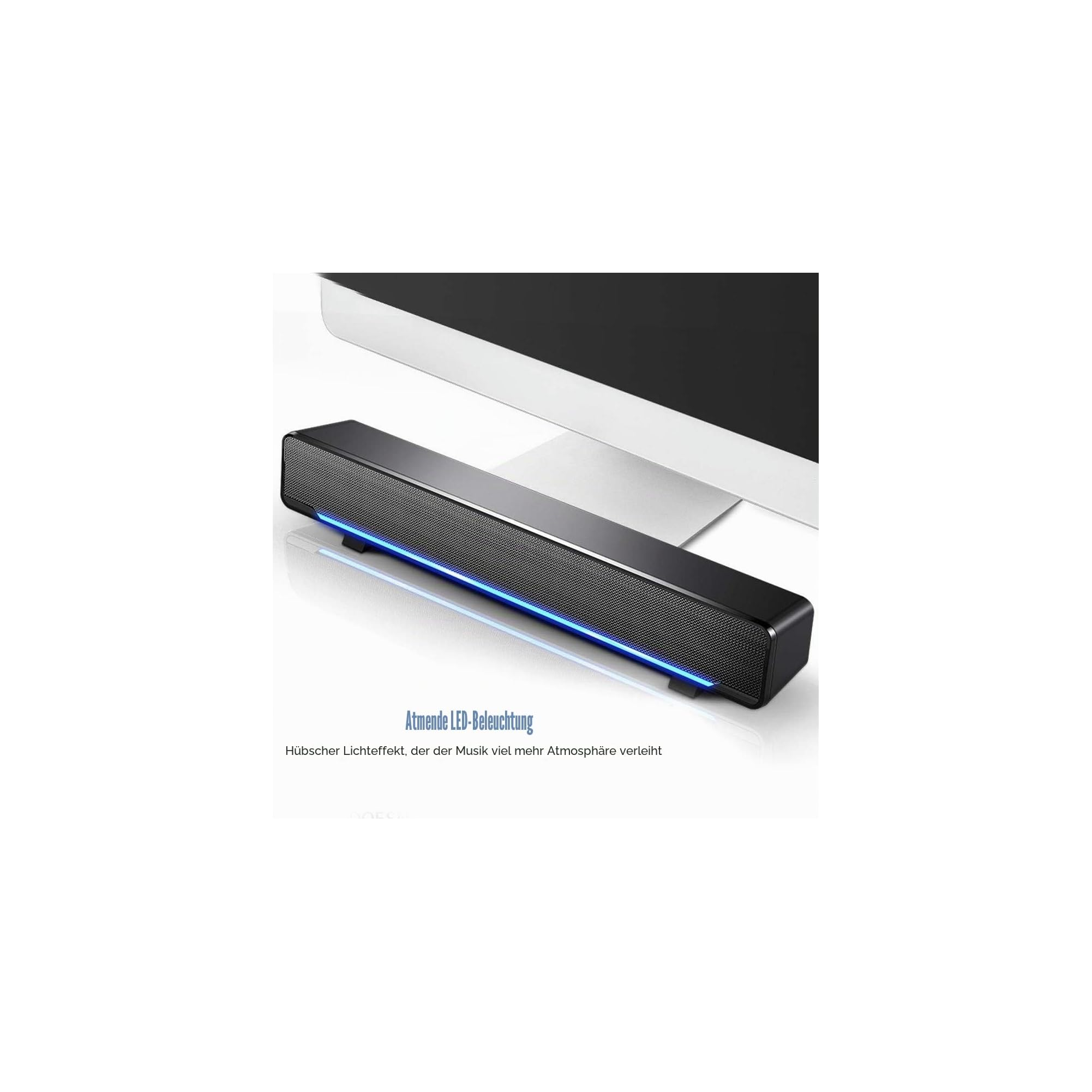 Eine schwarze Soundbar mit blauer LED-Beleuchtung sitzt vor einem Computermonitor.