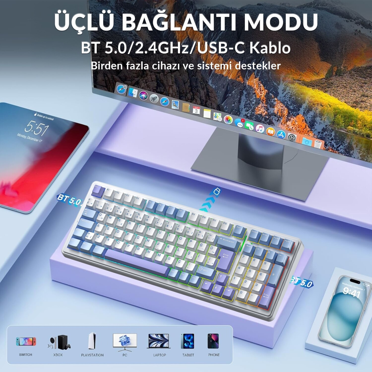 Mor masada beyaz ve mavi kablosuz klavye, monitör, tablet ve akıllı telefon.