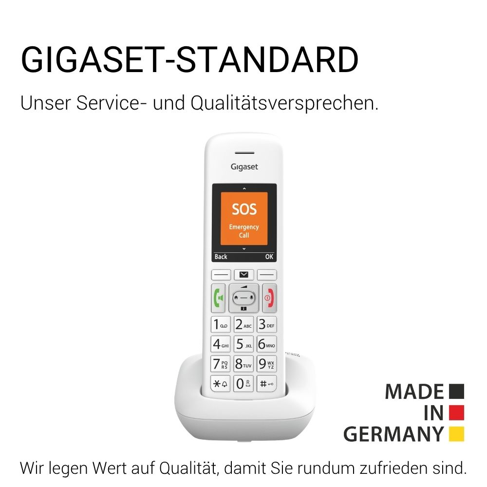Un telefono bianco Gigaset nella base di ricarica con schermo SOS arancione e la scritta Made in Germany.