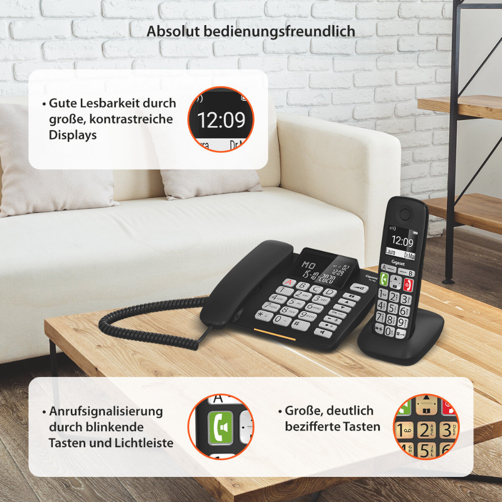Un telefono nero per anziani con grandi pulsanti e display chiaro su un tavolo di legno davanti a un divano.