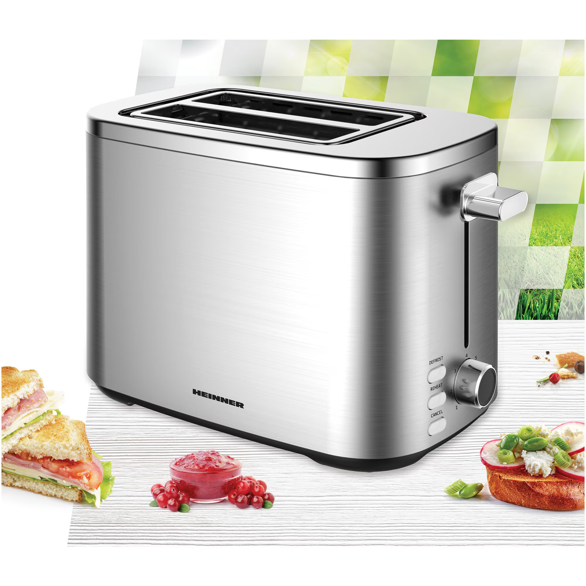 Ein silberner Heinner-Toaster steht auf weißem Tisch mit Sandwiches und roten Beeren.
