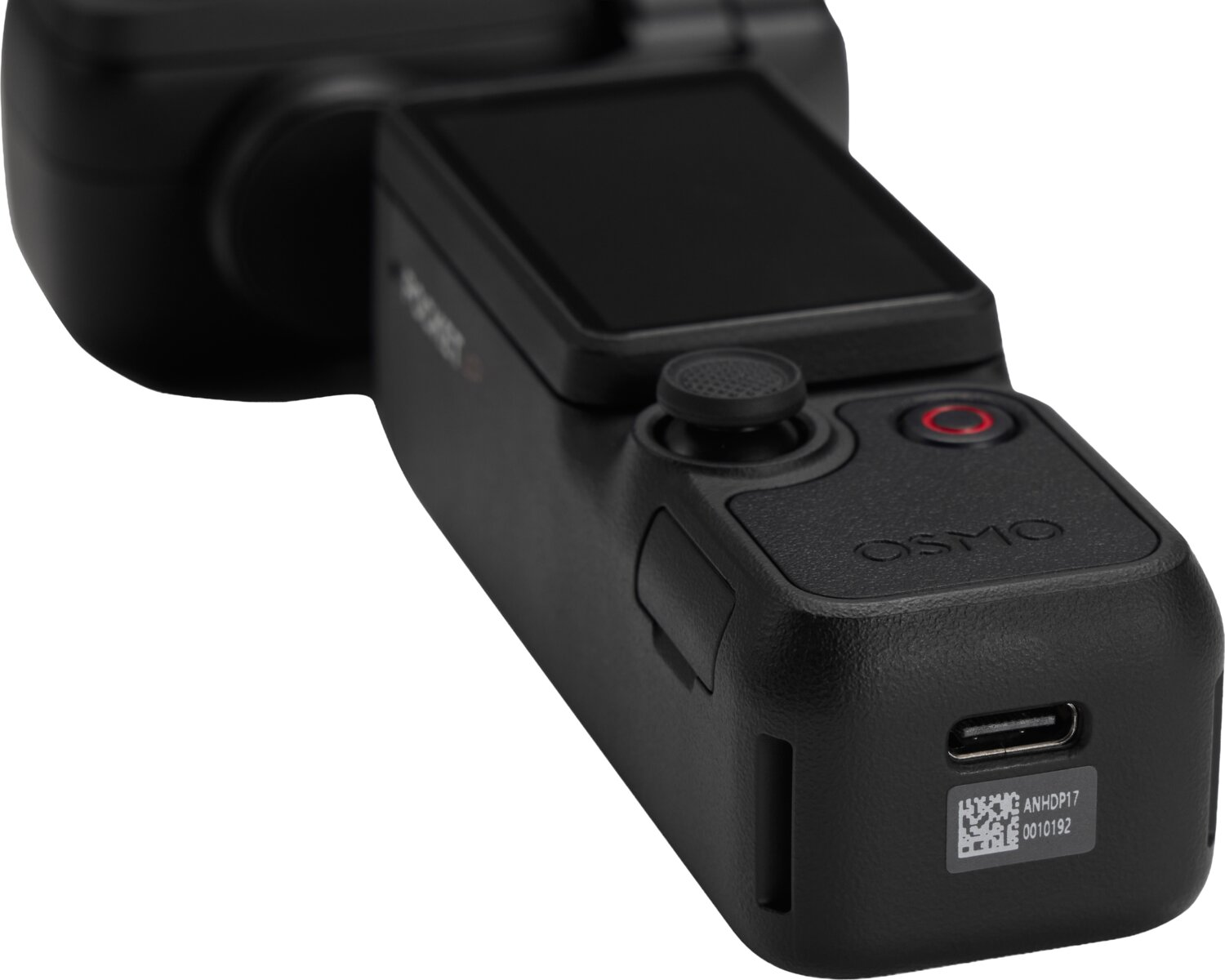 Beyaz arka planda USB-C bağlantı noktası, joystiki ve ekranı görünen siyah bir Osmo Pocket kamera tutacağının yakın planı.