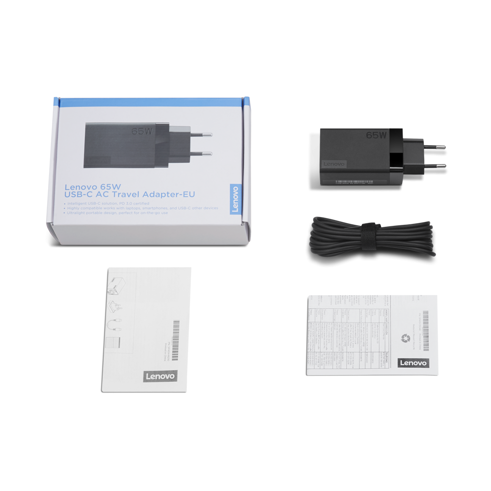 Siyah arka planda kutusu, kablosu ve kılavuzlarıyla bir Lenovo 65W USB-C seyahat adaptörü.