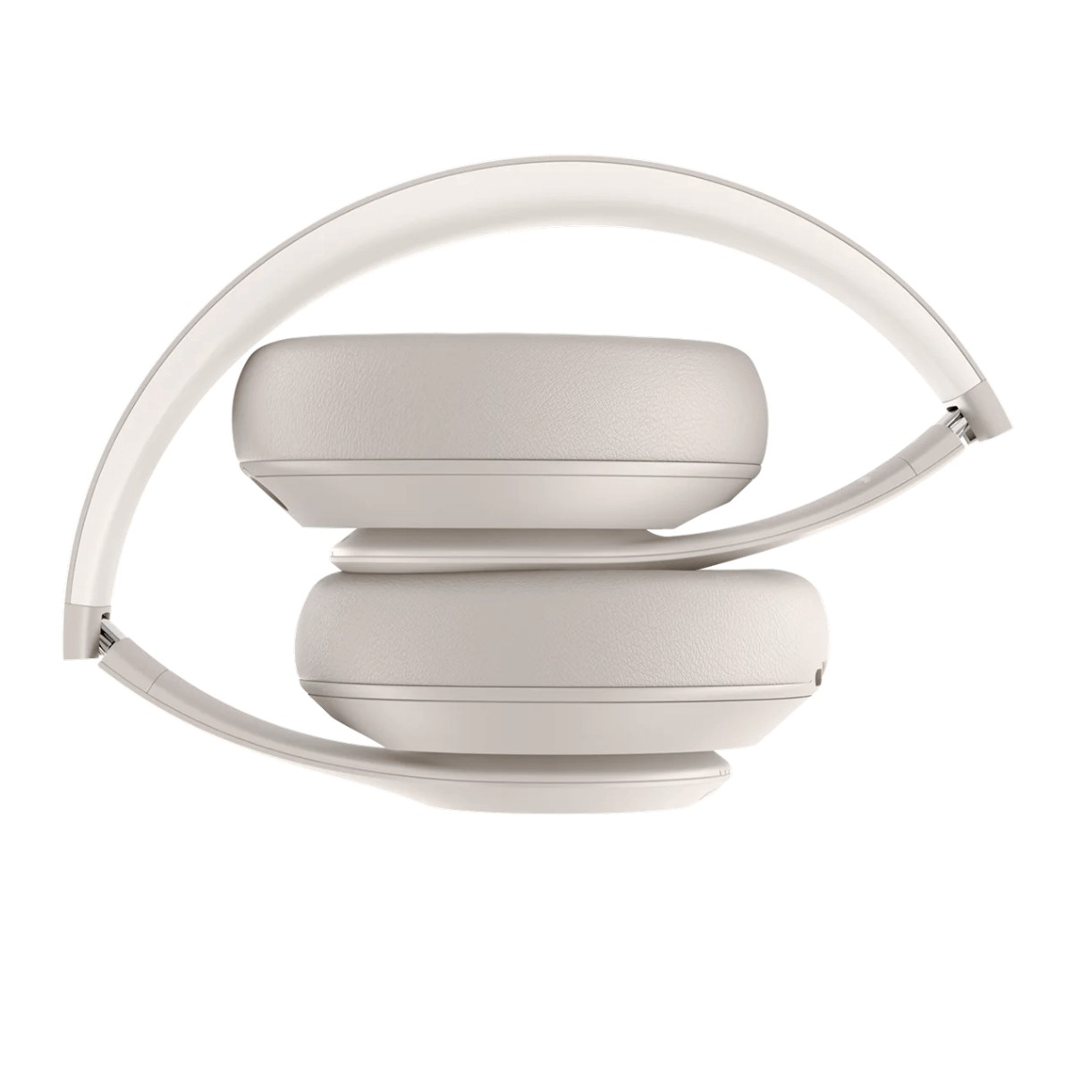 Casque supra-auriculaire pliable beige sur fond blanc.