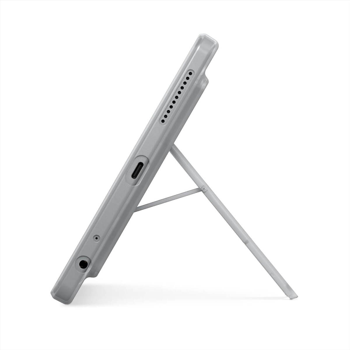 Vista laterale di un tablet grigio con supporto e porte su sfondo bianco.