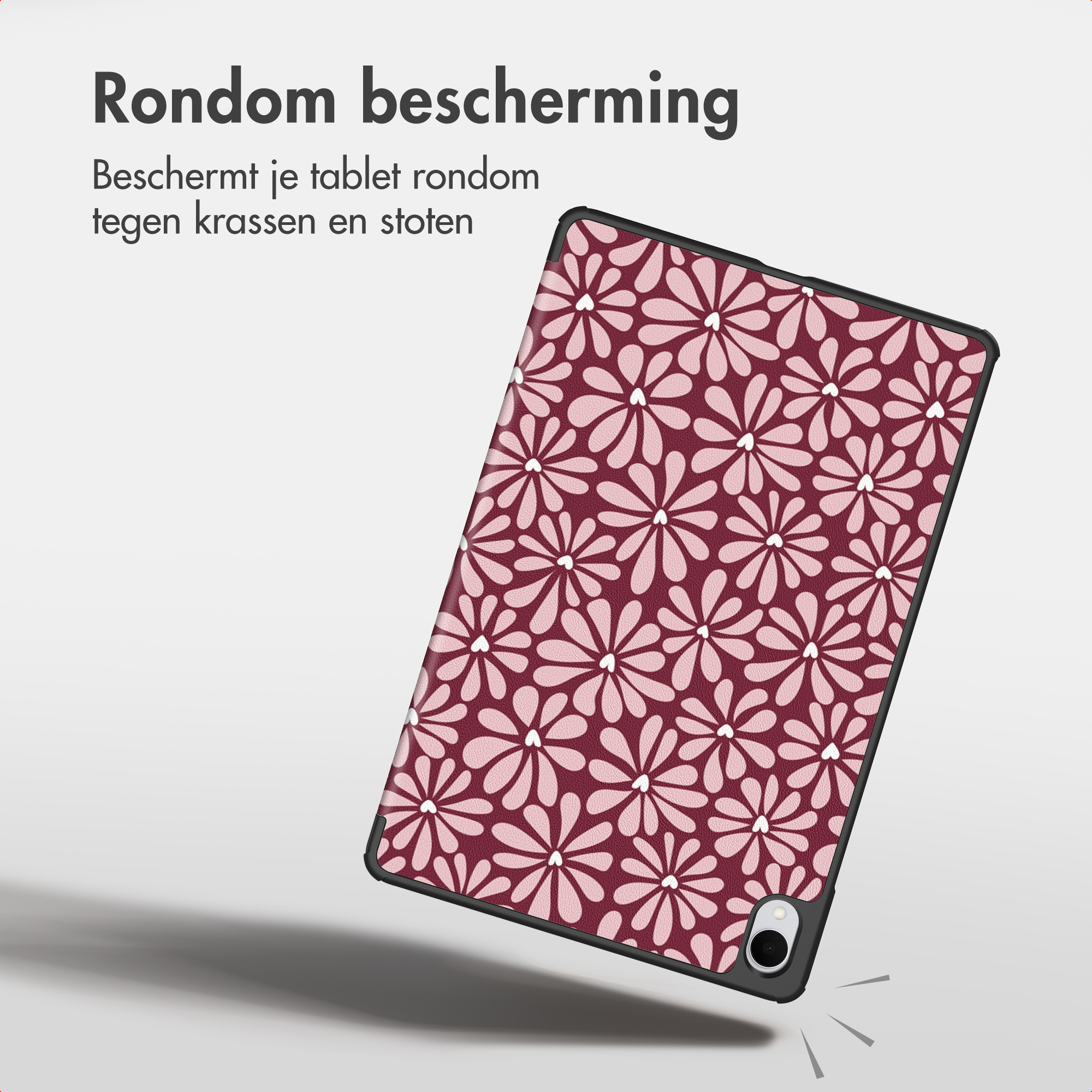 A tablet case with a pink and maroon floral pattern, featuring Dutch text about all-around protection.