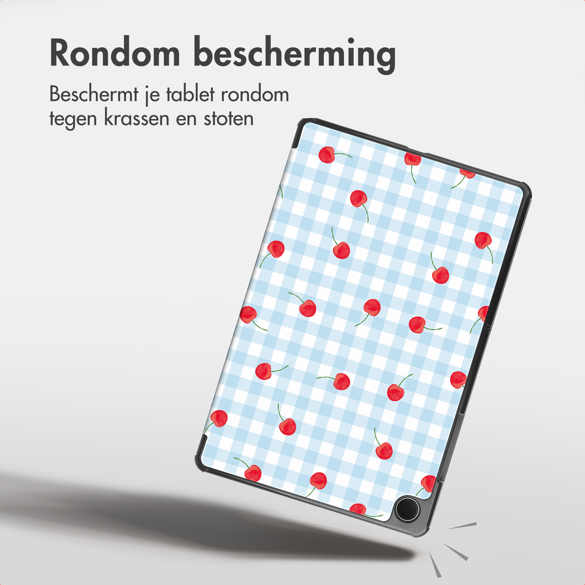A tablet with blue and white gingham and cherry patterned cover, with text at the top left.