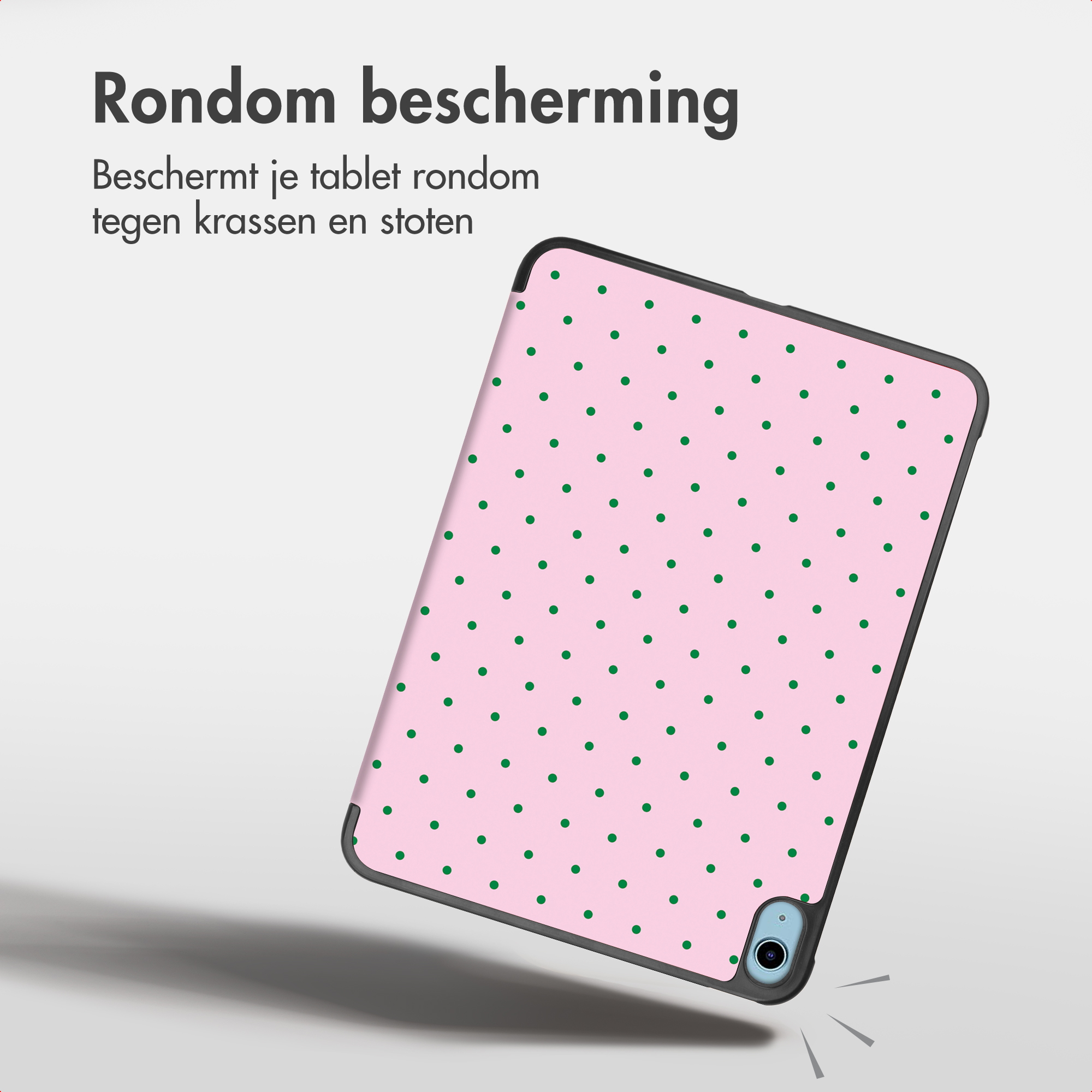 Une tablette dans un étui rose à pois verts avec du texte de protection.