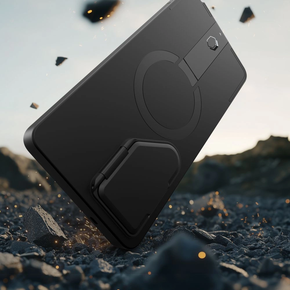 Ein schwarzes Smartphone mit Ständerhülle schwebt über felsigem Boden mit glühenden Trümmern in der Luft.
