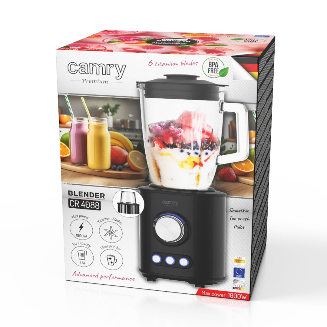 Verpackung eines schwarzen Camry Standmixers mit Glasaufsatz und Smoothie-Grafiken.
