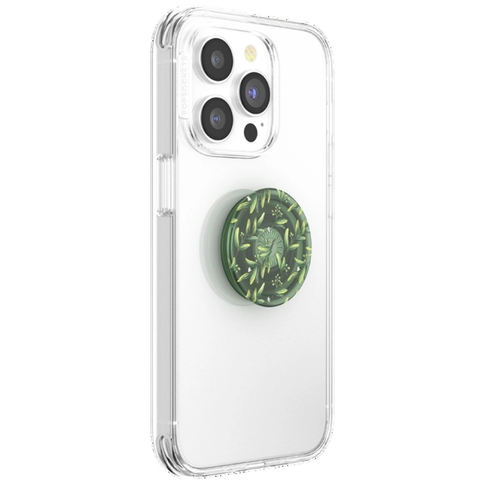 Custodia trasparente per cellulare con un supporto rotondo con motivo a foglie verdi.