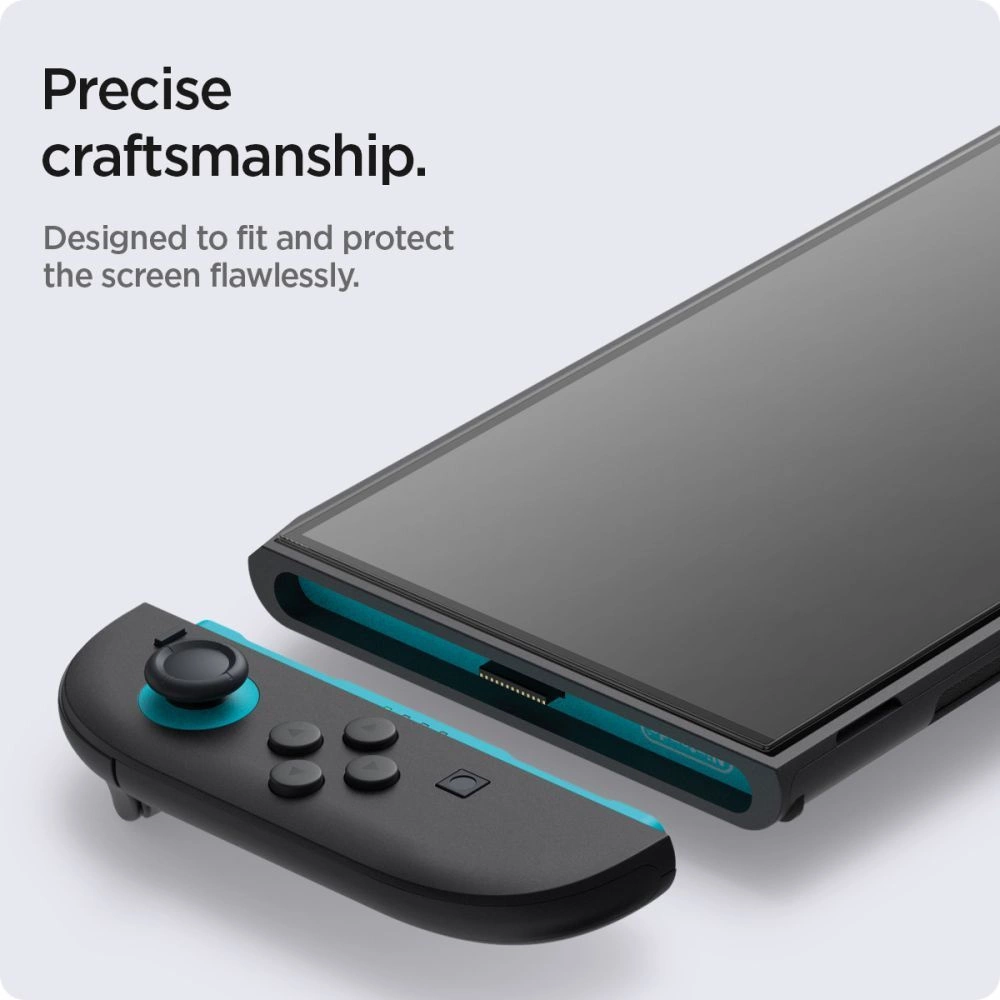 Artigianato preciso. Un controller di gioco nero accanto a una console.