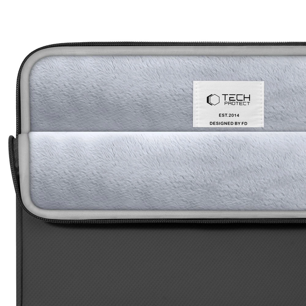 Gray laptop sleeve with soft plush lining and a label reading TECH PROTECT.